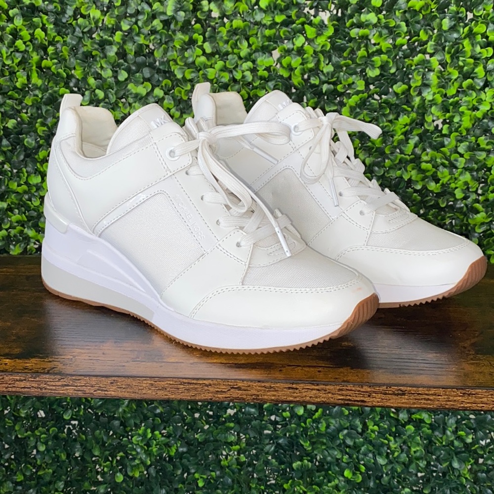 White Michael Kors Wedge Sneakers.